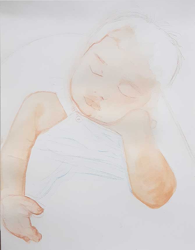 Drawing sleeping baby with watercolors